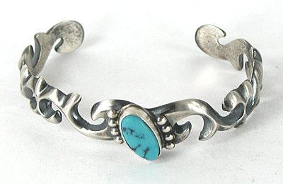 Authentic Native American tufa cast sterling silver and Turquoise Bracelet by Navajo artisan Harrison Bitsui