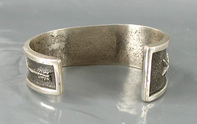 Authentic Native American handmade tufa cast sterling silver and coral inlay bracelet by Navajo silversmith Aaron Anderson size 6 1/4