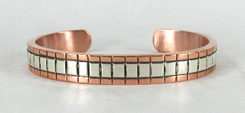 Copper with sterling silver overlay Bracelet by Navajo silversmith Jordan Gene