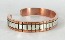 Copper with sterling silver overlay Bracelet by Navajo silversmith Jordan Gene