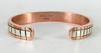 Copper with sterling silver overlay Bracelet by Navajo silversmith Jordan Gene