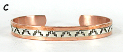 Copper with sterling silver overlay Bracelet by Navajo silversmith Jordan Gene