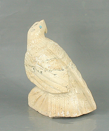 Zuni Eagle fetish of fishrock by Derrick Kaamasee