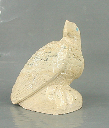 Zuni Eagle fetish of fishrock by Derrick Kaamasee