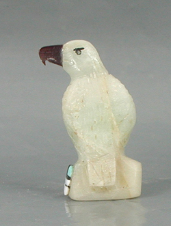 Zuni Eagle fetish of white Marble with inlaid sunface by Darrin Boone