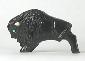 Bison Fetish Carving of Acoma jet with turquoise eyes and horns