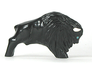 Bison Fetish Carving of Acoma jet with turquoise eyes and horns
