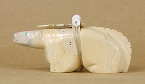 Authentic Native American Lion Fetish carving of fishrock by Zuni Wilford Cachini