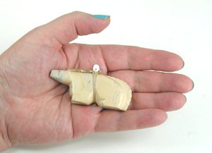 Authentic Native American Lion Fetish carving of fishrock by Zuni Wilford Cachini