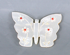 Authentic Native American Butterfly fetish carving of mother of pearl and coral by Zuni artisan Cheryl Beyuka