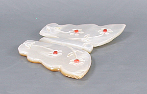 Authentic Native American Butterfly fetish carving of mother of pearl and coral by Zuni artisan Cheryl Beyuka