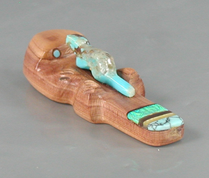 Authentic Native American Otter fetish carving of aromatic cedar by Zuni artisan Brandon Phillips
