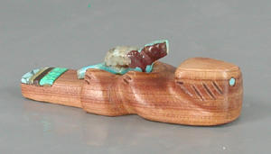 Authentic Native American Otter fetish carving of aromatic cedar by Zuni artisan Brandon Phillips