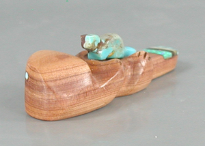 Authentic Native American Otter fetish carving of aromatic cedar by Zuni artisan Brandon Phillips