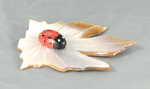 Authentic Native American Ladybug on Leaf fetish carving by Zuni artisan Cheryl Beyuka