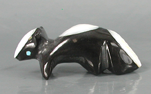 Authentic Native American skunk fetish by Zuni artisan Calvert Bowannie