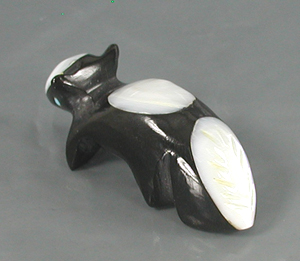 Authentic Native American skunk fetish carving by Zuni artisan Calvert Bowannie
