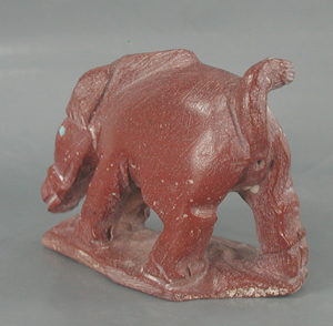 Authentic Native American javalina fetish carving by Zuni artisan Derrick Kaamasee