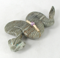 Authentic Native American Zuni Snake fetish carving of Picasso Marble by Paulette and Farlan Quam