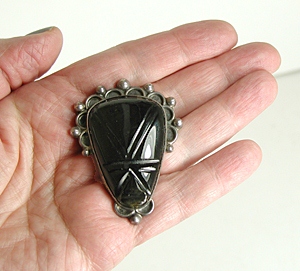 Vintage Mexican sterling silver black onyx mask pin
