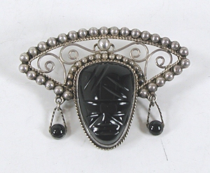 Vintage Mexican sterling silver black onyx mask pin