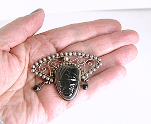 Vintage Mexican sterling silver black onyx mask pin