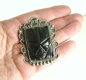 Vintage Mexican sterling silver black onyx mask pin