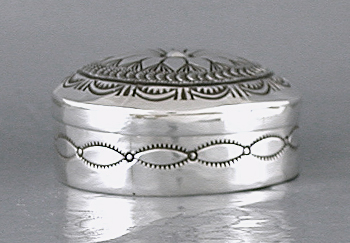 authentic Native American stamped repousse sterling silver round box by Navajo silversmith Arnold Blackgoat