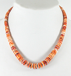 Authentic Native American 17 inch orange spiny oyster heishi necklace by Santo Domingo artisan Ramon Calavaza