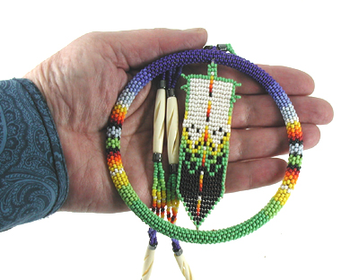 Authentic Native American hand beaded feather in hoop necklace by Oglala Lakota artisan
