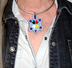 Authentic Native American hand bead Turtle Pendant by Lakota prison inmates