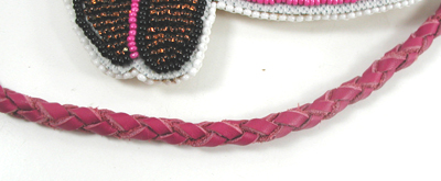 Authentic Native American hand beaded fancy dancer pendant on Braided Leather Necklace by Lakota prison inmate