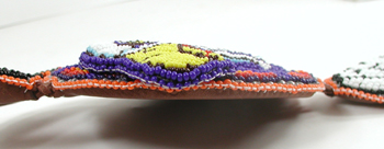 Authentic Native American hand beaded Eagle pendant on Braided Leather Necklace by Lakota prison inmate