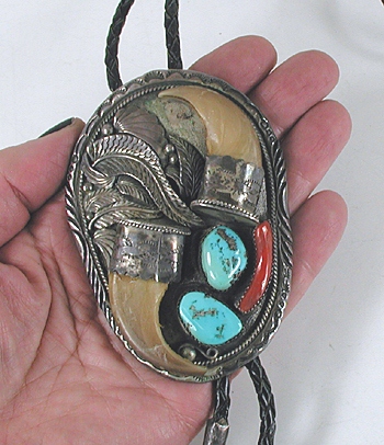 vintage sterling silver Twin Claws with turquoise and coral Bolo tie