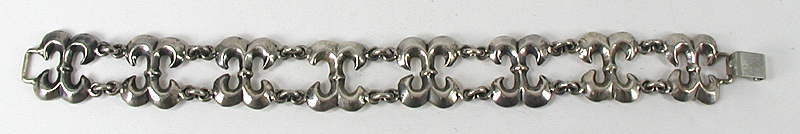 Cast sterling silver link bracelet fits up to 7 1/2 inch wrist - excellent condition