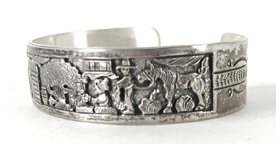 Authentic Native American Sterling Silver Storyteller Bracelet by Navajo artisan Benny Benally 