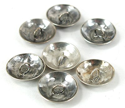 Seven vintage sterling silver Buttons