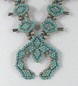 Authentic Native American vintage collectible museum quality sterling silver and turquoise squash blossom necklace by Zuni artist Frank Dishta 