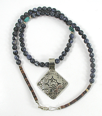 lapis bead necklace with stamped sterling silver pendant by Navajo artisans Charlene and Robert Little 20 inches long 