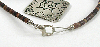 lapis bead necklace with stamped sterling silver pendant by Navajo artisans Charlene and Robert Little 20 inches long 