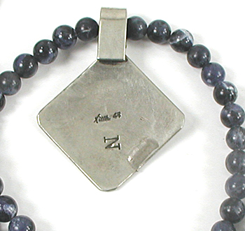 lapis bead necklace with stamped sterling silver pendant by Navajo artisans Charlene and Robert Little 20 inches long 
