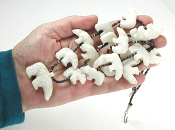 33 inch necklace with Pen Shell heishi and 19 white alabaster bears
