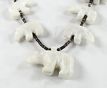 33 inch necklace with Pen Shell heishi and 19 white alabaster bears