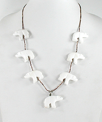 24 inch necklace with Olive Shell heishi and 7 white alabaster bears