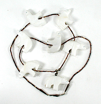 24 inch necklace with Olive Shell heishi and 7 white alabaster bears