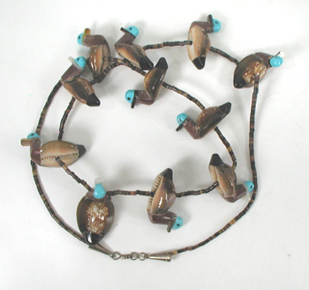 27 1/2 inch cowrie shell ducks and olive shell heishi necklace by Navajo artisan Maybelle Kelewood