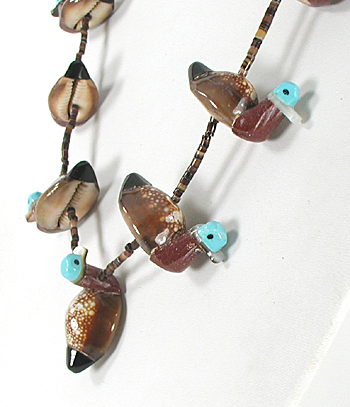 27 1/2 inch cowrie shell ducks and olive shell heishi necklace by Navajo artisan Maybelle Kelewood