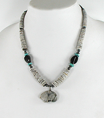 LomaSiiva melon shell heishi necklace 20 inches long with Picasso marble bear, excellent condition