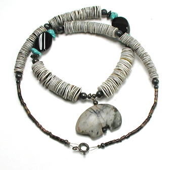 LomaSiiva melon shell heishi necklace 20 inches long with Picasso marble bear, excellent condition