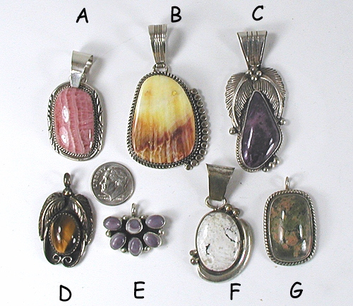 seven vintage Sterling Silver and turquoise pendants